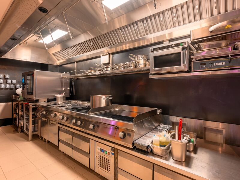 Commercial kitchen cooking line installed by Cleresdyne, Zanussi equipment with exhaust hood