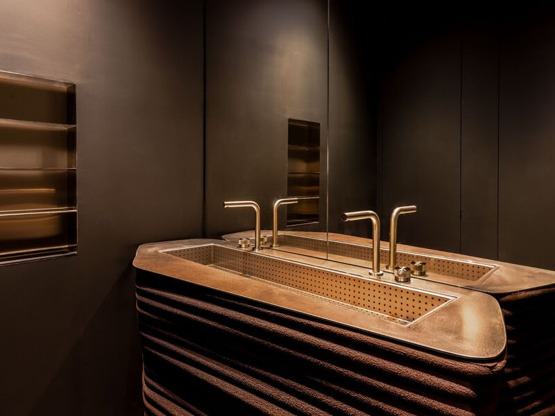 Custom stainless steel bathroom vanity with perforated drain top, fabricated by Cleresdyne for Myata Platinum, Citywalk Dubai